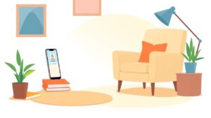 Een gezellige woonkamer met comfortabele stoel, smartphone en boeken.